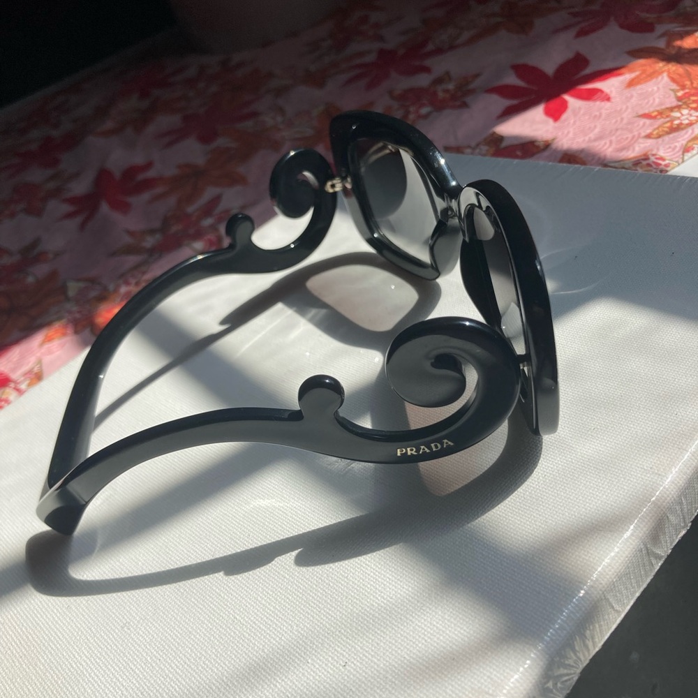 Prada Elegant Black Swirl Sunglasses